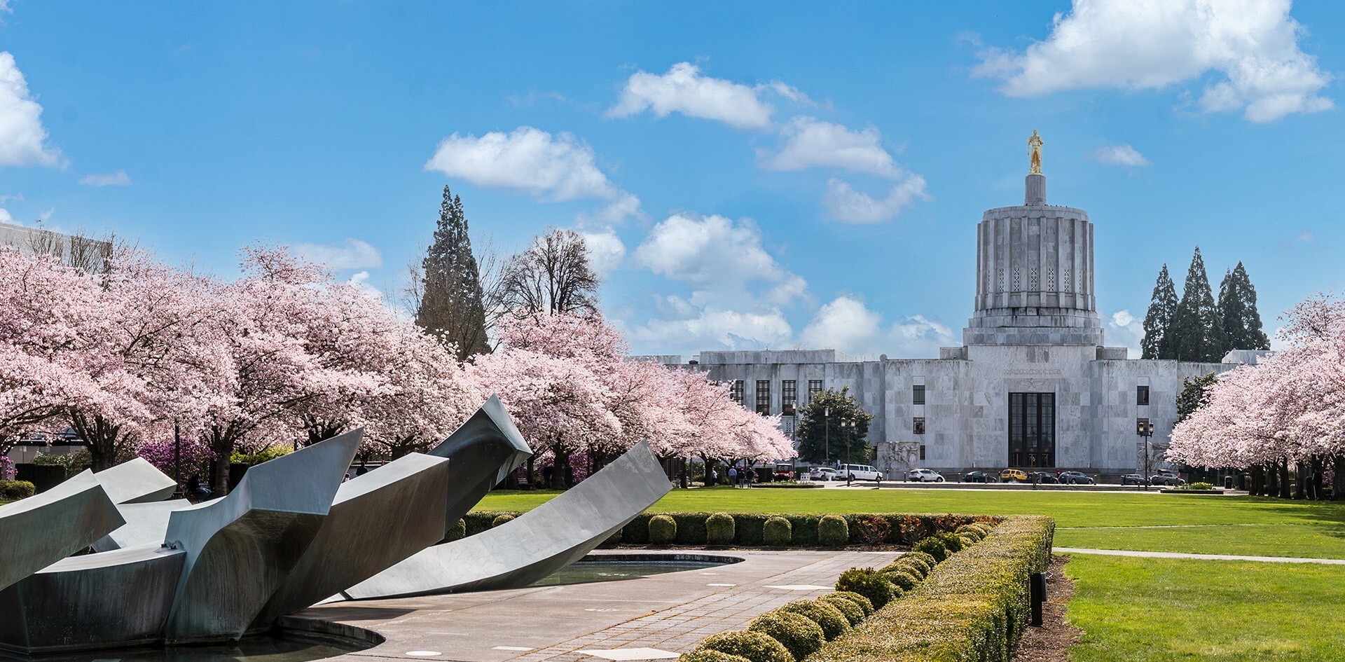 Oregon State Capitol with cherry blossoms in Salem, Oregon